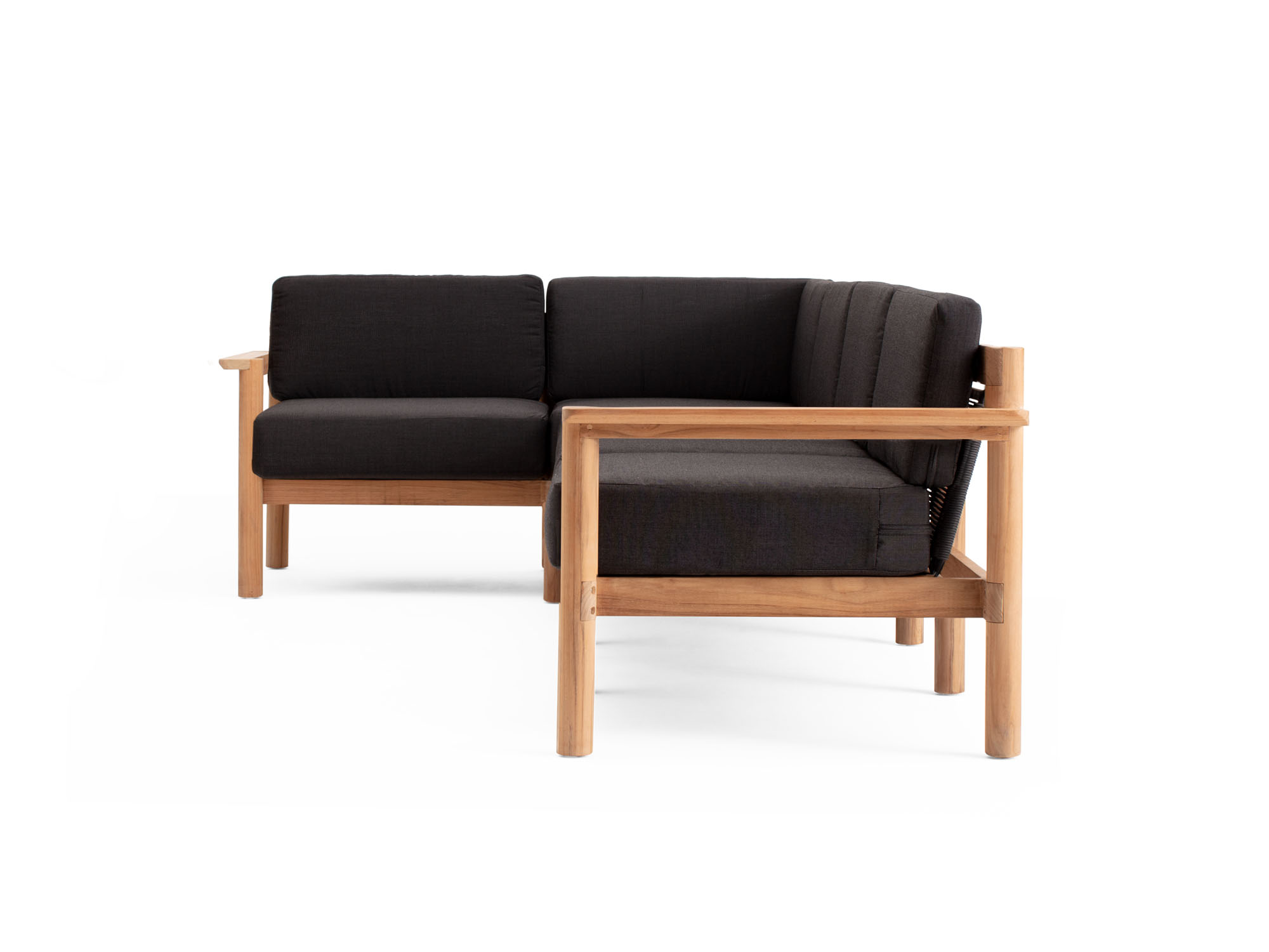Side view of 4-piece outdoor sectional with black cushions